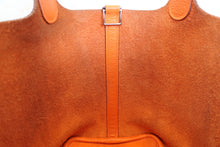 Load image into Gallery viewer, HERMES PICOTIN PM Clemence leather Orange Hand bag 700020210
