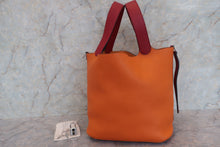 Load image into Gallery viewer, HERMES PICOTIN LOCK TOUCH GM Clemence leather/Swift leather Orange/Rouge grenet X Engraving Hand bag 700110144