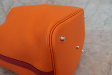 Load image into Gallery viewer, HERMES PICOTIN LOCK TOUCH GM Clemence leather/Swift leather Orange/Rouge grenet X Engraving Hand bag 700110144