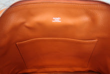 Load image into Gallery viewer, HERMES/BOLIDE 1923 Togo leather Orange Hand bag 700090061