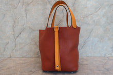 Load image into Gallery viewer, HERMES PICOTIN LOCK TOUCH MM Clemence leather/Swift leather Cuivre/Jaune d'or X Engraving Hand bag 700090134