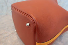 Load image into Gallery viewer, HERMES PICOTIN LOCK TOUCH MM Clemence leather/Swift leather Cuivre/Jaune d'or X Engraving Hand bag 700090134