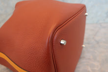 Load image into Gallery viewer, HERMES PICOTIN LOCK TOUCH MM Clemence leather/Swift leather Cuivre/Jaune d'or X Engraving Hand bag 700090134
