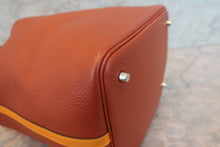 Load image into Gallery viewer, HERMES PICOTIN LOCK TOUCH MM Clemence leather/Swift leather Cuivre/Jaune d'or X Engraving Hand bag 700090134