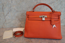 画像をギャラリービューアに読み込む, HERMES/エルメス ケリー32 トリヨンクレマンス オレンジ □M刻印 ショルダーバッグ 800010066