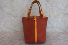 將圖片載入圖庫檢視器 HERMES/エルメス ピコタンロックタッチMM トリヨンクレマンス/ヴォースイフト キュイーブル/ジョーヌドール X刻印 ハンドバッグ 800020139