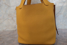 Load image into Gallery viewer, HERMES PICOTIN LOCK PM Clemence leather Jaune ambre Y Engraving Hand bag 700090184