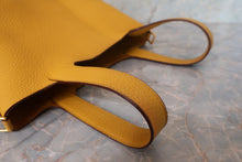 Load image into Gallery viewer, HERMES PICOTIN LOCK PM Clemence leather Jaune ambre Y Engraving Hand bag 700090184