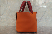 Load image into Gallery viewer, HERMES PICOTIN LOCK TOUCH PM Clemence leather/Swift leather Orange/Rouge grenet X Engraving Hand bag 700120155