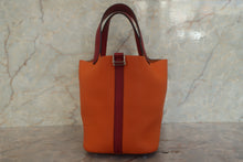 Load image into Gallery viewer, HERMES PICOTIN LOCK TOUCH PM Clemence leather/Swift leather Orange/Rouge grenet X Engraving Hand bag 700120155