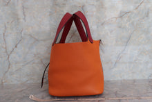 Load image into Gallery viewer, HERMES PICOTIN LOCK TOUCH PM Clemence leather/Swift leather Orange/Rouge Grenet X Engraving Hand bag 700040175