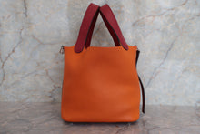 Load image into Gallery viewer, HERMES PICOTIN LOCK TOUCH PM Clemence leather/Swift leather Orange/Rouge Grenet X Engraving Hand bag 700040175
