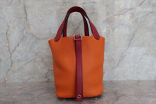 Load image into Gallery viewer, HERMES PICOTIN LOCK TOUCH PM Clemence leather/Swift leather Orange/Rouge Grenet X Engraving Hand bag 700040175
