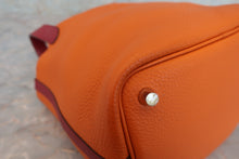 Load image into Gallery viewer, HERMES PICOTIN LOCK TOUCH PM Clemence leather/Swift leather Orange/Rouge Grenet X Engraving Hand bag 700040175