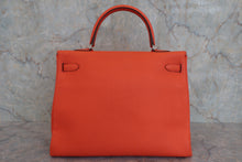 画像をギャラリービューアに読み込む, HERMES/エルメス ケリー35 トリヨンクレマンス オレンジポピー T刻印 ショルダーバッグ 800040063