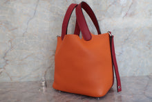 Load image into Gallery viewer, HERMES PICOTIN LOCK TOUCH PM Clemence leather/Swift leather Orange/Rouge Grenet X Engraving Hand bag 600090108
