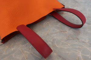 HERMES PICOTIN LOCK TOUCH PM Clemence leather/Swift leather Orange/Rouge Grenet X Engraving Hand bag 600090108