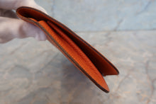 Load image into Gallery viewer, HERMES  Dogon GM Togo leather Orange □H Engraving Wallet 700090224
