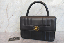 Load image into Gallery viewer, CHANEL Mademoiselle Hand bag Lambskin Black/Gold hadware Hand bag 700010188
