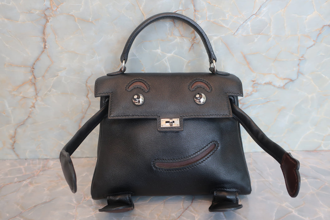 HERMES Kelly Dole Gulliver leather Black/Brown Hand bag 600070152