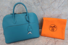 Load image into Gallery viewer, HERMES／BOLIDE 1923 Swift leather Turquoise blue □K Engraving Hand bag 600060142
