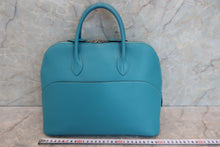 Load image into Gallery viewer, HERMES／BOLIDE 1923 Swift leather Turquoise blue □K Engraving Hand bag 600060142
