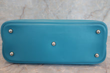 Load image into Gallery viewer, HERMES／BOLIDE 1923 Swift leather Turquoise blue □K Engraving Hand bag 600060142
