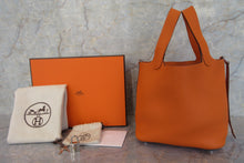 Load image into Gallery viewer, HERMES PICOTIN LOCK PM Clemence leather Orange □M Engraving Hand bag 600120300
