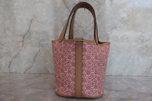 HERMES PICOTIN LOCK Micro（micro） Lucky Daisy Swift leather Chai/Pink/White U Engraving Hand bag 600080061