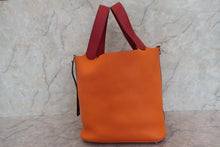 Load image into Gallery viewer, HERMES PICOTIN LOCK TOUCH GM Clemence leather/Swift leather Orange/Rouge grenet X Engraving Hand bag 700110144
