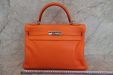 Load image into Gallery viewer, HERMES KELLY 32 Gulliver leather Orange □E Engraving Shoulder bag 700110154
