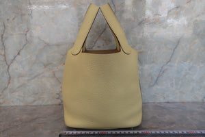 HERMES PICOTIN LOCK PM Clemence leather Jaune poussin X Engraving Hand bag 700090101