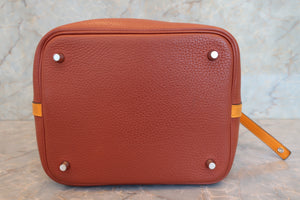 HERMES PICOTIN LOCK TOUCH MM Clemence leather/Swift leather Cuivre/Jaune d'or X Engraving Hand bag 700090134