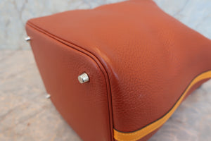 HERMES PICOTIN LOCK TOUCH MM Clemence leather/Swift leather Cuivre/Jaune d'or X Engraving Hand bag 700090134
