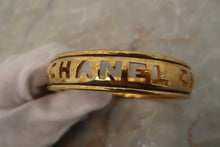 Load image into Gallery viewer, CHANEL Logo Bangle Gold plated Gold Bangle 500090264
