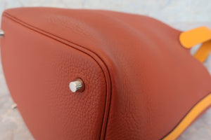 HERMES PICOTIN LOCK TOUCH MM Clemence leather/Swift leather Cuivre/Jaune d'or X Engraving Hand bag 700060008