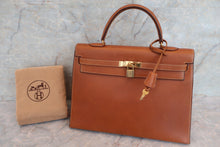 Load image into Gallery viewer, HERMES KELLY 35 Graine Lisse leather Brown 〇D Engraving Hand bag 600070068
