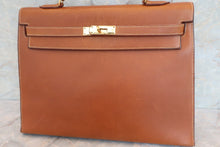 Load image into Gallery viewer, HERMES KELLY 35 Graine Lisse leather Brown 〇D Engraving Hand bag 600070068
