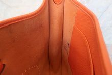 Load image into Gallery viewer, HERMES  EVELYNE 1PM Togo leather Orange □G Engraving Shoulder bag 700120048
