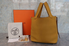 画像をギャラリービューアに読み込む, HERMES／エルメス ピコタンロックＰＭ トリヨンクレマンス ジョーヌアンブル Y刻印 ハンドバッグ 700090184
