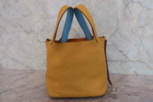 将图片加载到图库查看器，HERMES PICOTIN LOCK ECLAT PM Clemence leather/Swift leather Jaune ambre/Celeste C刻印 Hand bag 800080199
