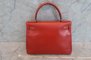 HERMES KELLY 28 Box carf leather Brique 〇P Engraving Hand bag 500100170