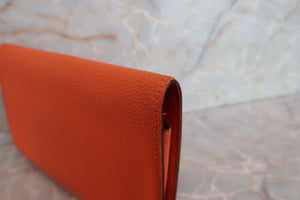 HERMES／エルメス ドゴンGM トゴ オレンジ □I刻印 財布 700020126